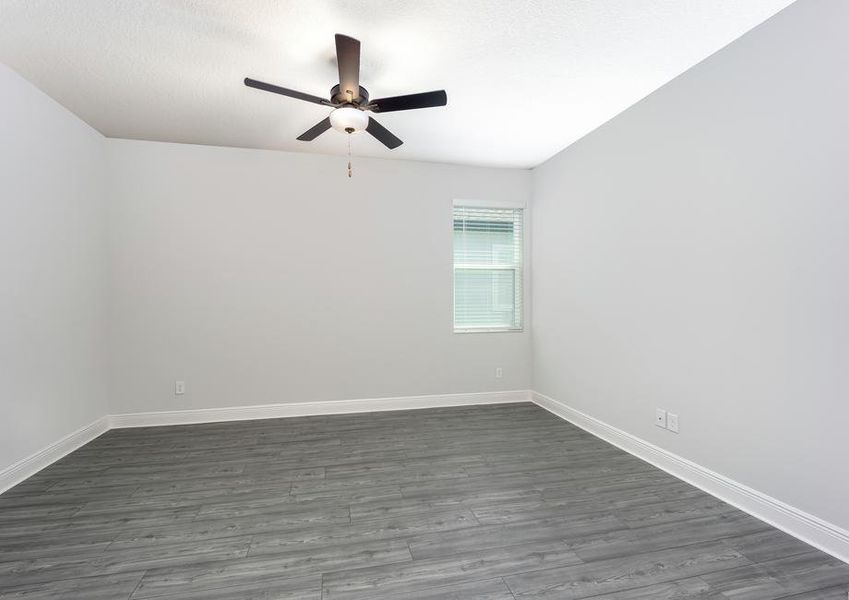 The private master bedroom with vinyl flooring