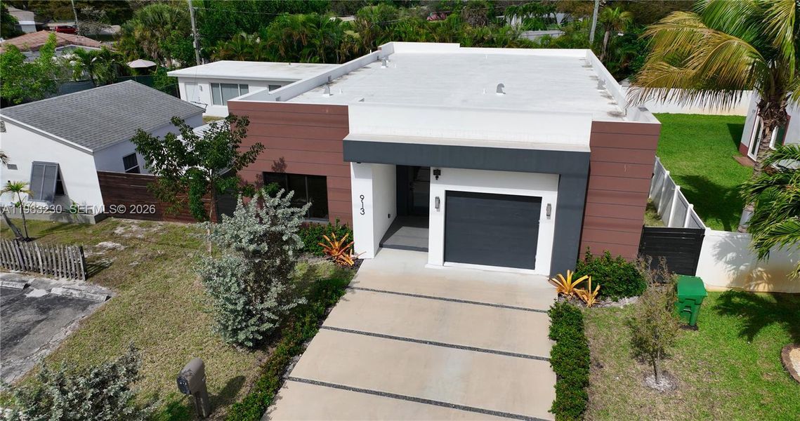Front exterior of a new home in , Fort Lauderdale, FL, highlighting curb appeal (Image 24). Front exterior of a new home in , Fort Lauderdale, FL, highlighting curb appeal (Image 24).
