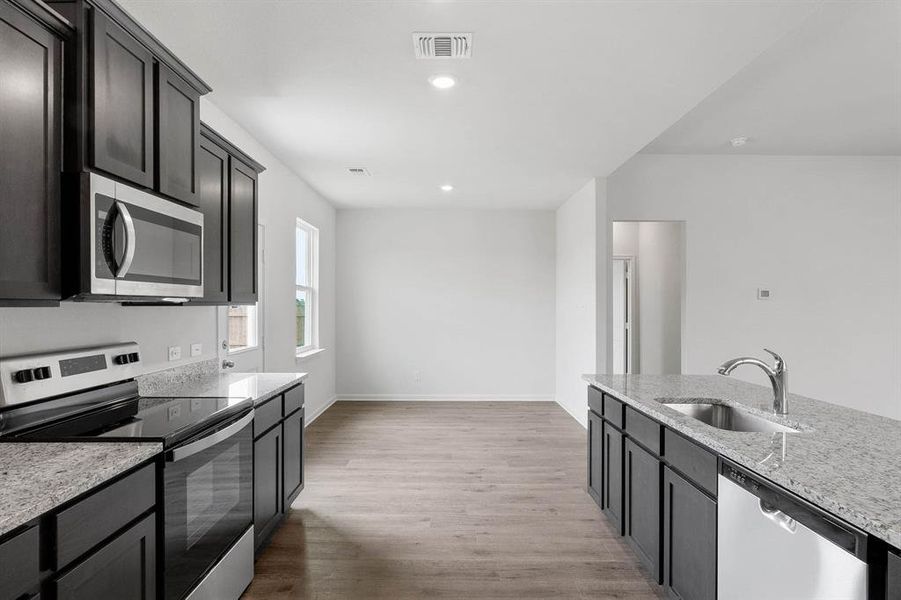 Furnished interior view inside a new home in Retreat at Fossil Creek, Fort Worth (Image 4).
