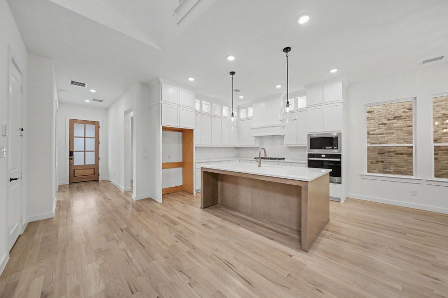 Furnished interior view inside a new home in Light Farms Brenham - 40' Lots, Celina (Image 7).