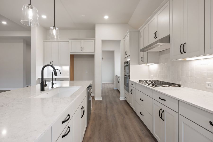 Representative furnished interior of a home built from the Carolina by Ashton Woods in The Estates at La Cima, San Marcos (Image 8). Representative furnished interior of a home built from the Carolina by Ashton Woods in The Estates at La Cima, San Marcos (Image 8).