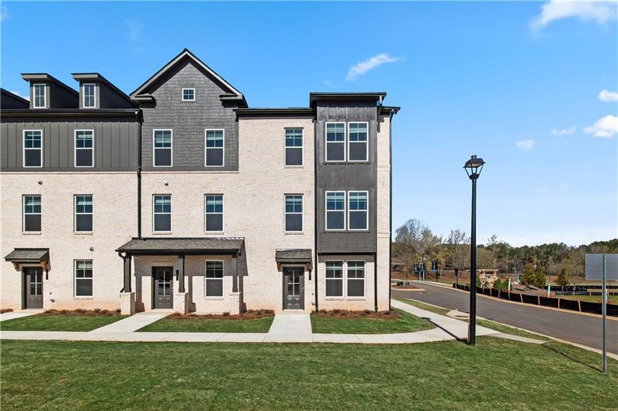 Front exterior of a new home in Daybreak, Newnan, GA, highlighting curb appeal (Image 22).