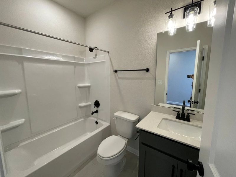 Furnished interior view inside a new home in Covered Bridge, Hutto (Image 5). Furnished interior view inside a new home in Covered Bridge, Hutto (Image 5).