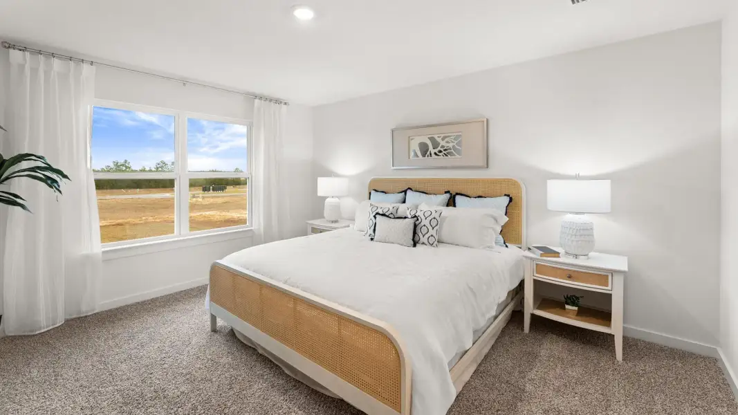 Furnished interior view inside a new home in Magnolia at the Bluffs Phase 3, Freeport (Image 17).