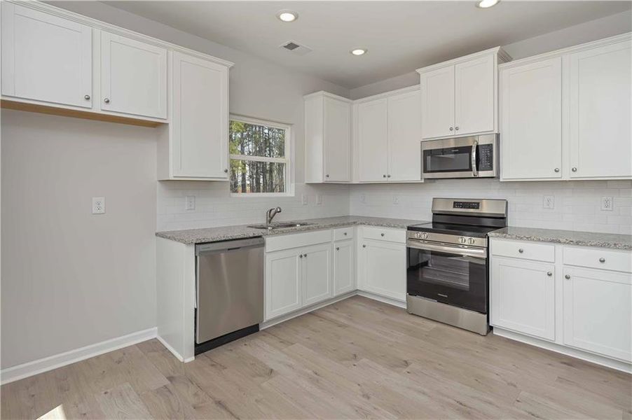 Furnished interior view inside a new home in , Villa Rica (Image 5). Furnished interior view inside a new home in , Villa Rica (Image 5).