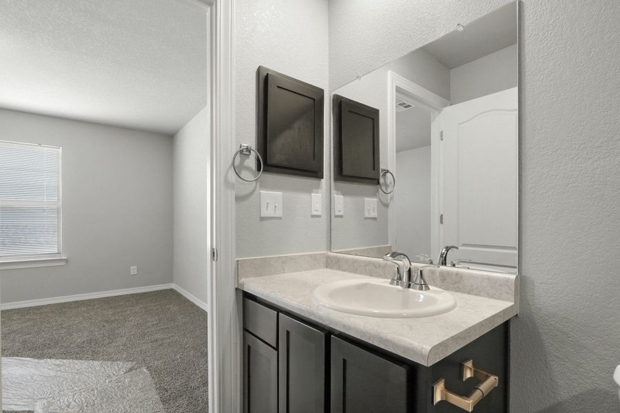 Furnished interior view inside a new home in Rancho Desierto Bello, El Paso (Image 6).