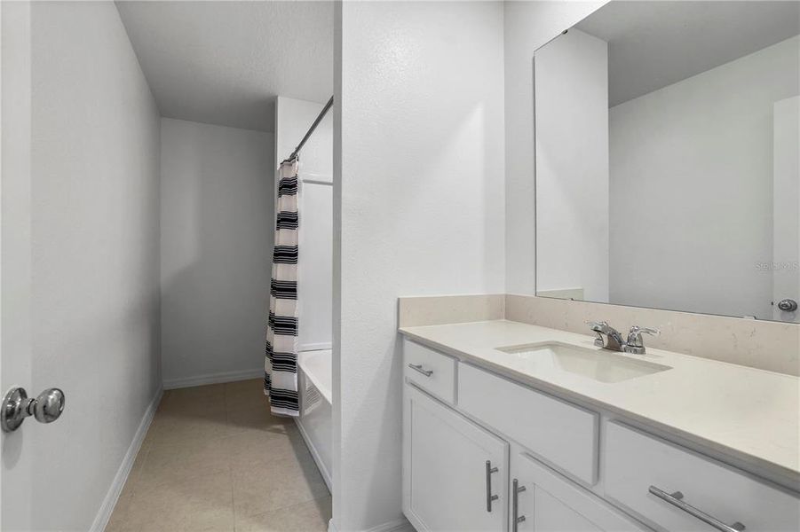 Furnished interior view inside a new home in Cypress Point at Lake Parker, Lakeland (Image 17).