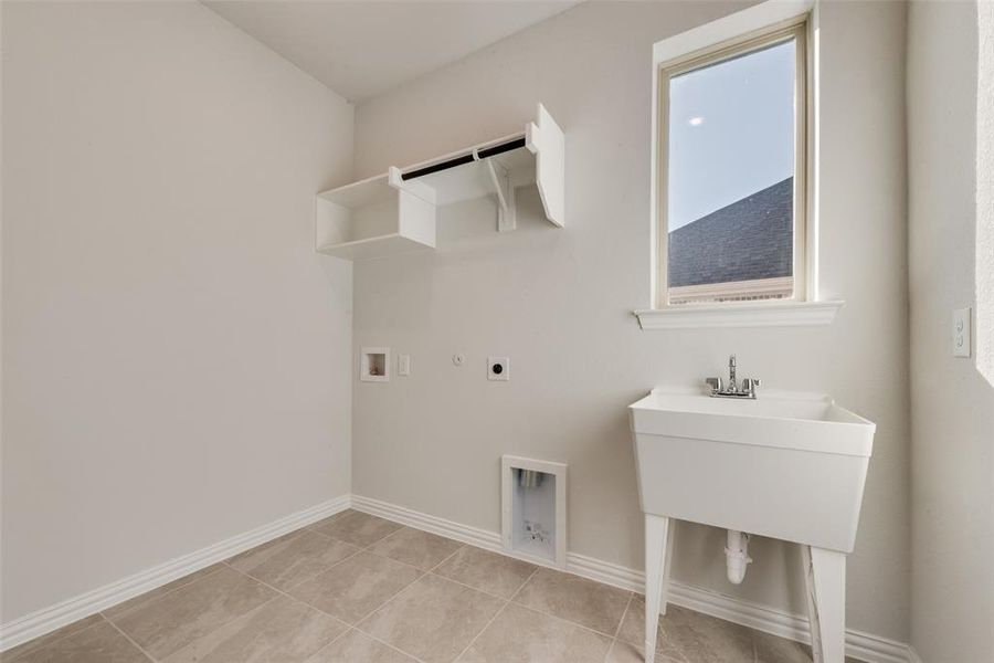 Furnished interior view inside a new home in Villages of Hurricane Creek, Anna (Image 9).