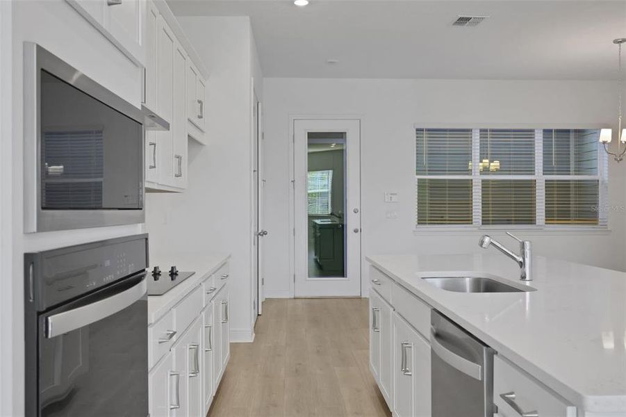 Furnished interior view inside a new home in , St. Cloud (Image 10).