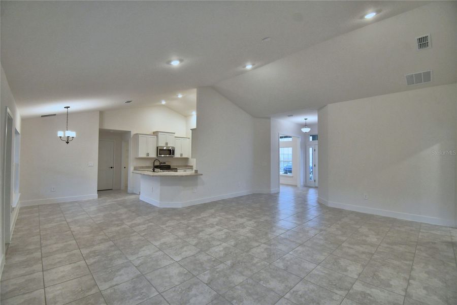 Spacious, unfurnished interior of a new home in Cadence Crossing, Auburndale (Image 27).