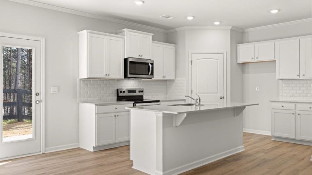 Furnished interior view inside a new home in Falcon Landing, Gainesville (Image 4).