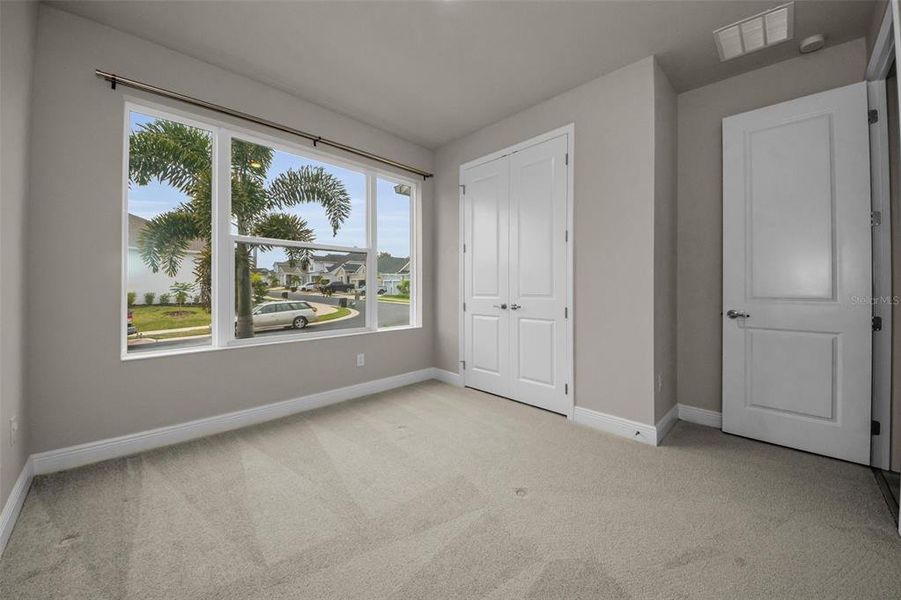 Spacious, unfurnished interior of a new home in Eagle Creek - Garden Series, Tarpon Springs (Image 16).
