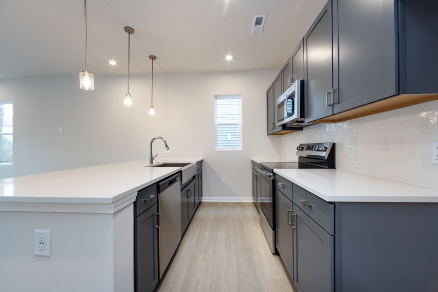 Furnished interior view inside a new home in Fifteen 15 Cannon, Charlotte (Image 13).