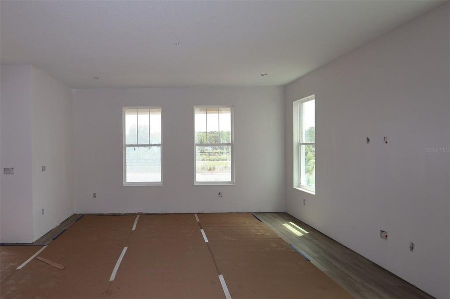 In-progress construction of a new home in Center Lake on the Park, St. Cloud, FL (Image 15).