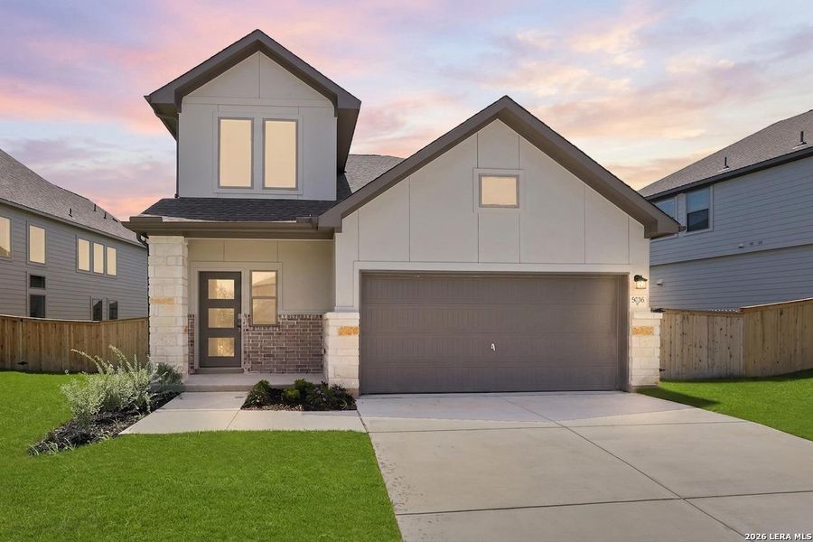 Front exterior of a new home in The Parklands, Schertz, TX, highlighting curb appeal (Image 24). Front exterior of a new home in The Parklands, Schertz, TX, highlighting curb appeal (Image 24).