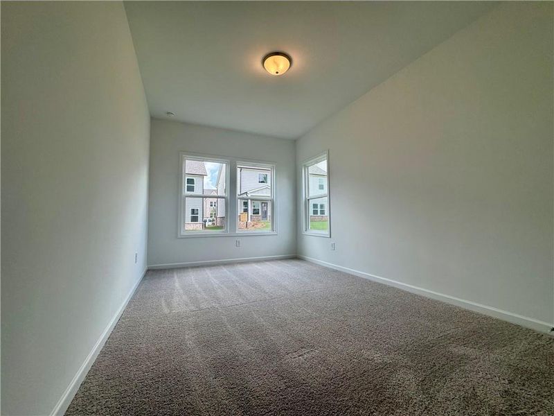 Spacious, unfurnished interior of a new home in Eastlyn Crossing - Single Family, Flowery Branch (Image 45). Spacious, unfurnished interior of a new home in Eastlyn Crossing - Single Family, Flowery Branch (Image 45).