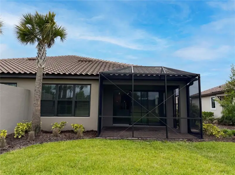 Exterior details and patio area of a home in , Sarasota (Image 16).