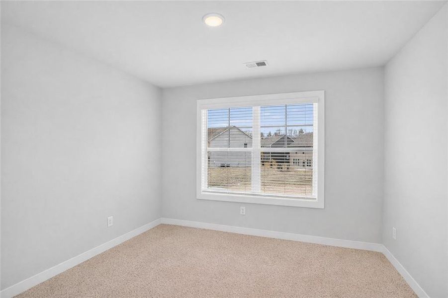 Spacious, unfurnished interior of a new home in The Fairways at Mirror Lake, Villa Rica (Image 28).