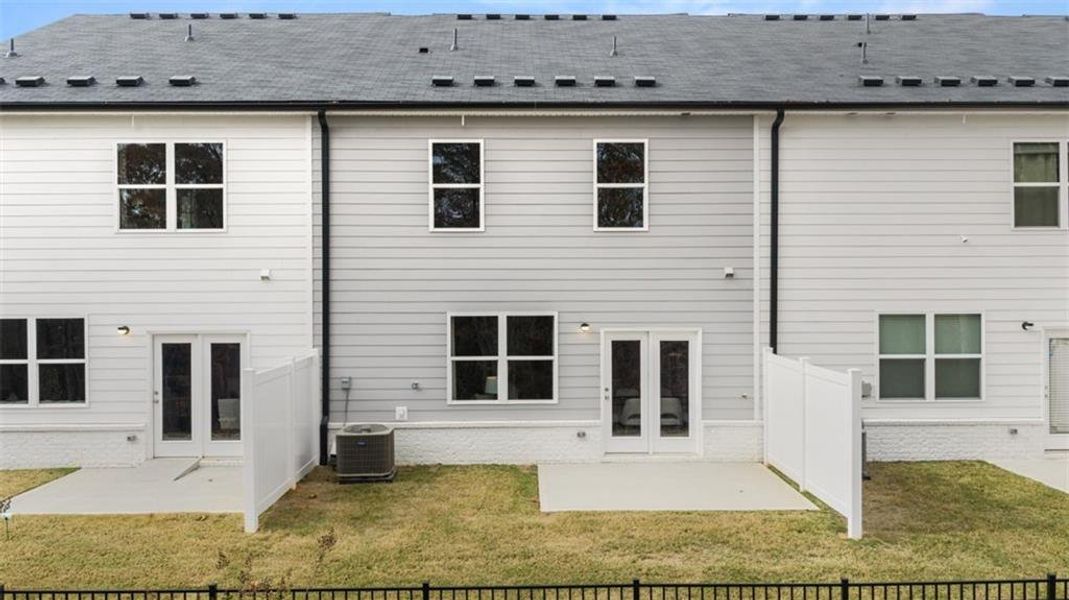 Exterior details and patio area of a home in Echo Glen, Stockbridge (Image 28).