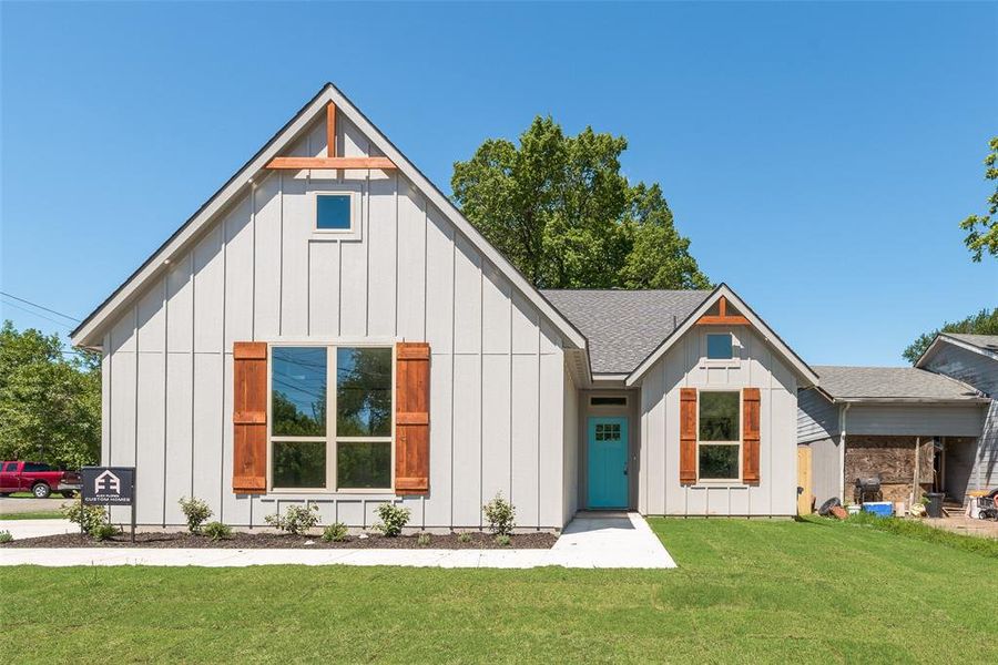 Front exterior of a new home in , Greenville, TX, highlighting curb appeal (Image 1). Front exterior of a new home in , Greenville, TX, highlighting curb appeal (Image 1).