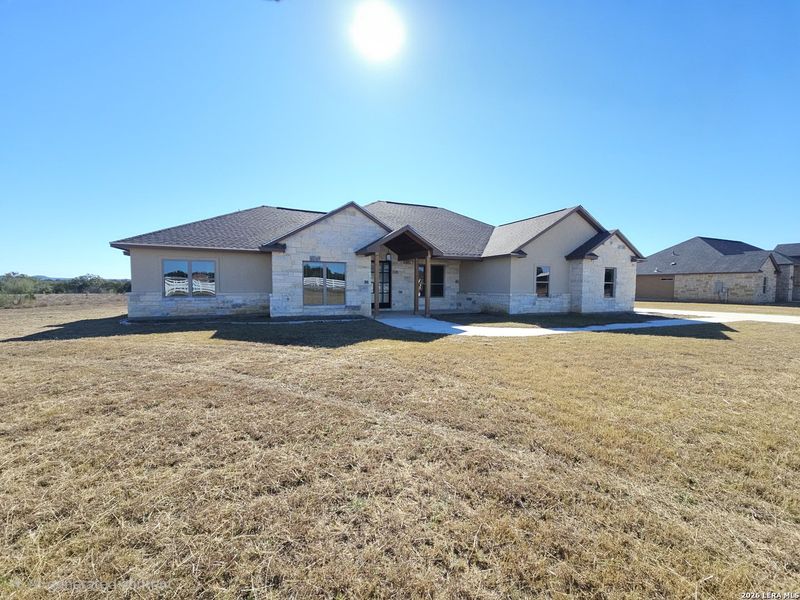 Exterior details and patio area of a home in , Bandera (Image 16).