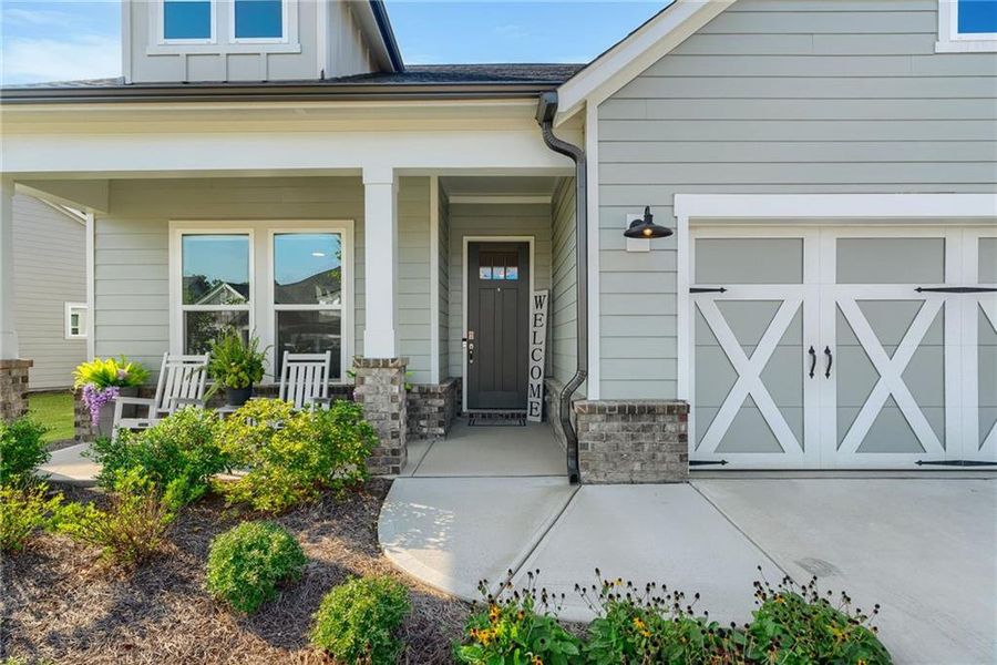 Exterior details and patio area of a home in Crescent Pointe at Great Sky, Canton (Image 3).
