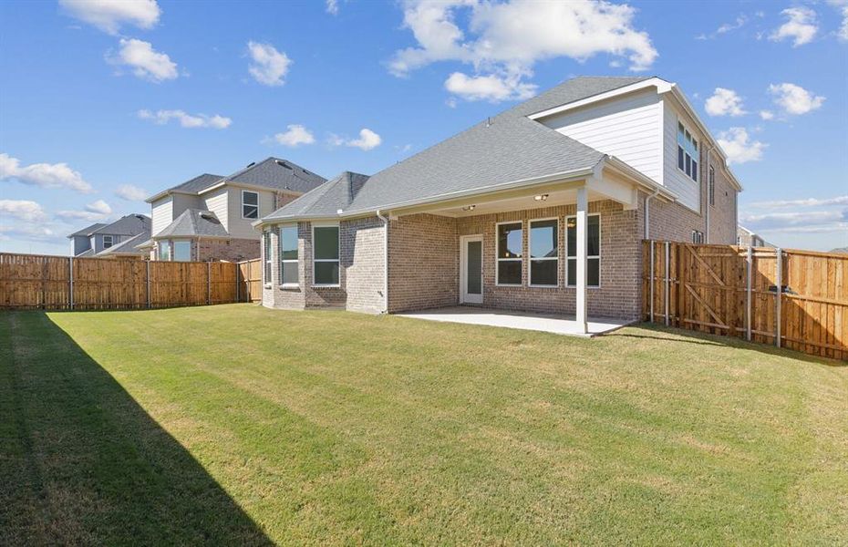 Beautiful large backyard with covered patio Beautiful large backyard with covered patio