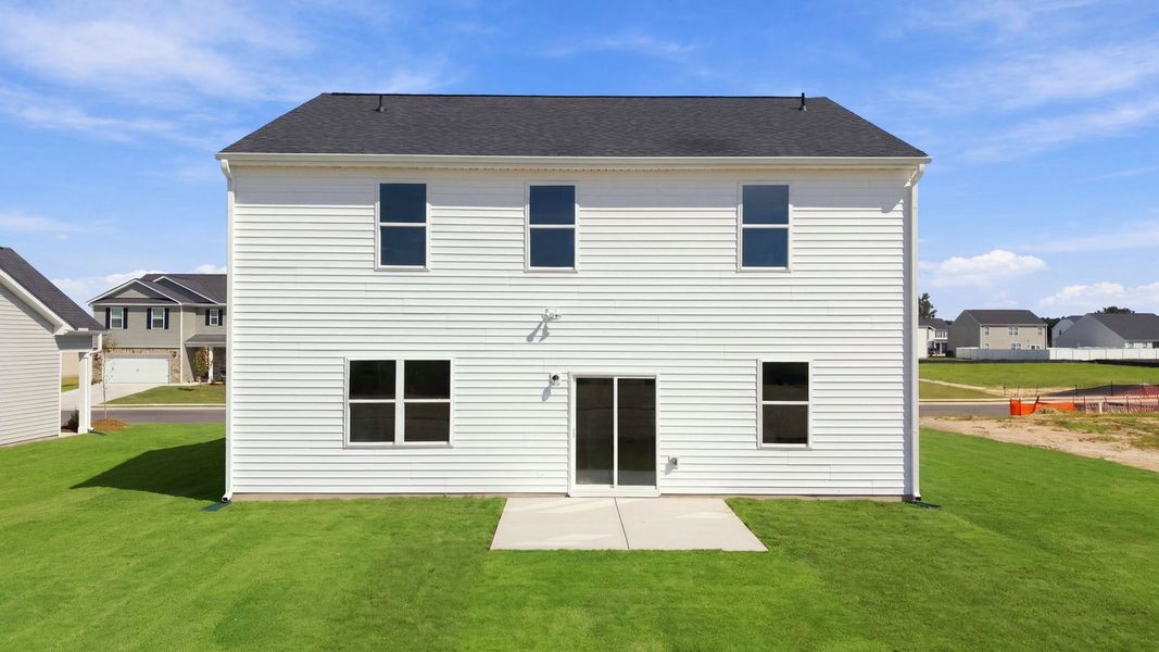 Exterior details and patio area of a home in East Ridge, Ayden (Image 19).
