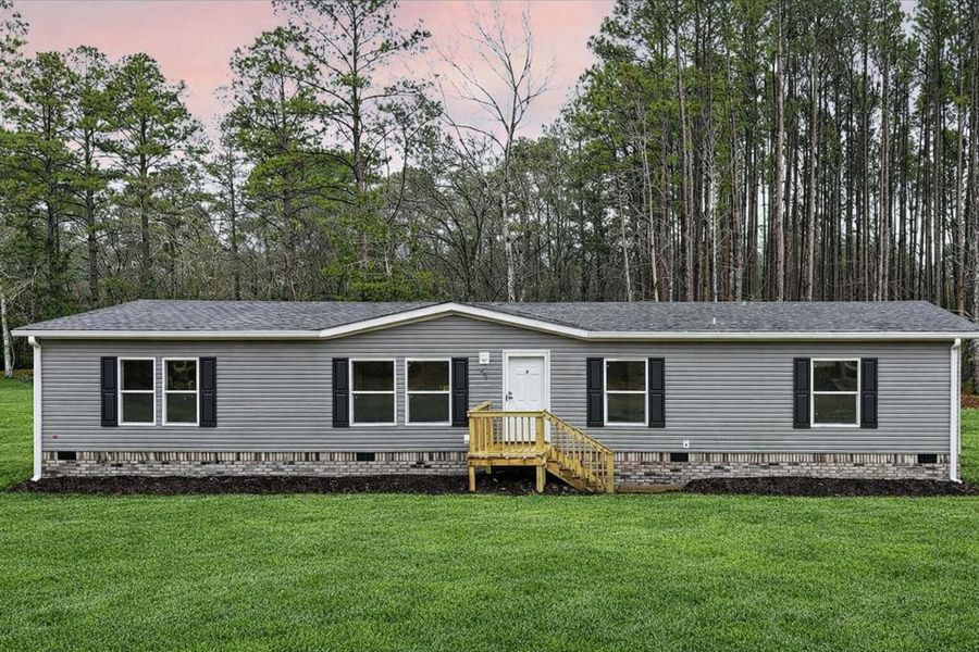 Exterior details and patio area of a home in , Walterboro (Image 21).