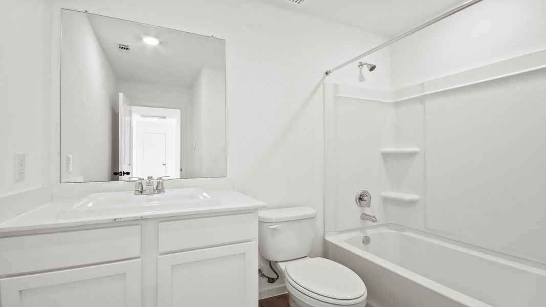 Furnished interior view inside a new home in Lake Conroe Cove, Willis (Image 7).