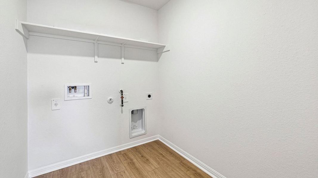 Spacious, unfurnished interior of a new home in Bar W Ranch, Leander (Image 28).