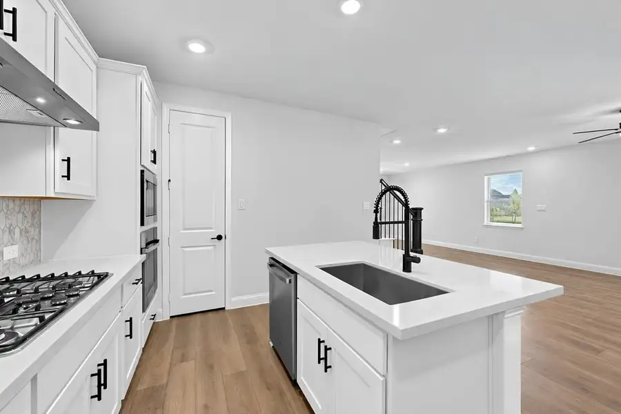Furnished interior view inside a new home in Cross Creek Meadows, Celina (Image 9).
