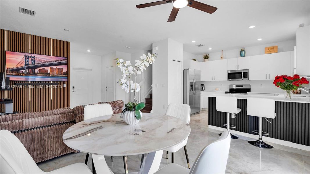 Upgraded porcelain tile flooring & LED-lit porcelain accent wall