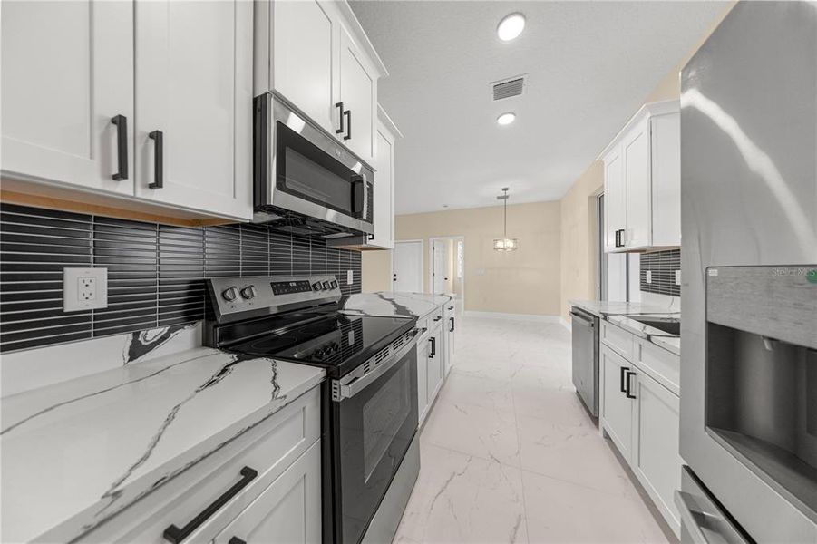 Furnished interior view inside a new home in , Belleview (Image 8).