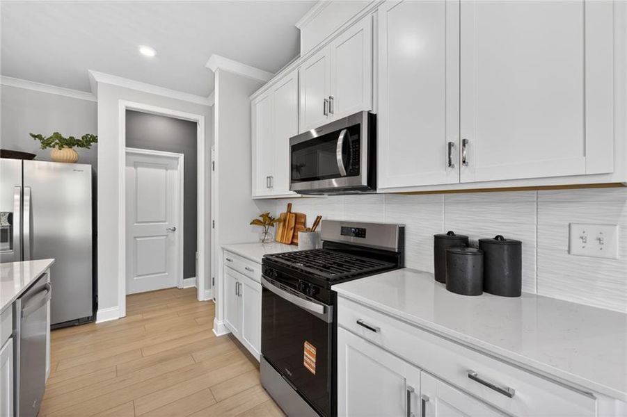 Furnished interior view inside a new home in Ansley Towns, Cumming (Image 8).