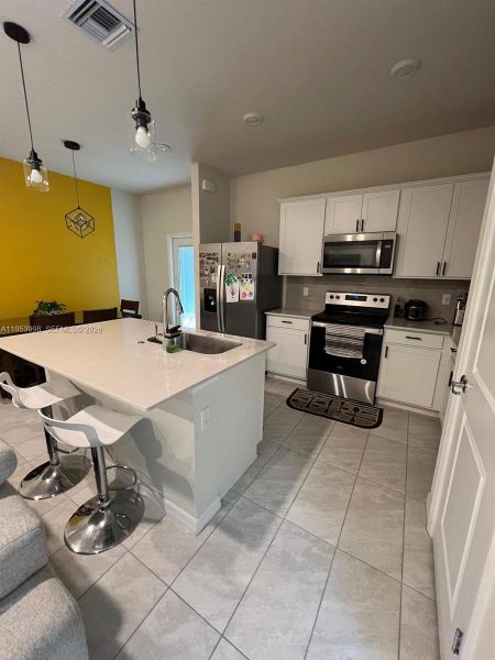 Furnished interior view inside a new home in , Lauderdale Lakes (Image 6).