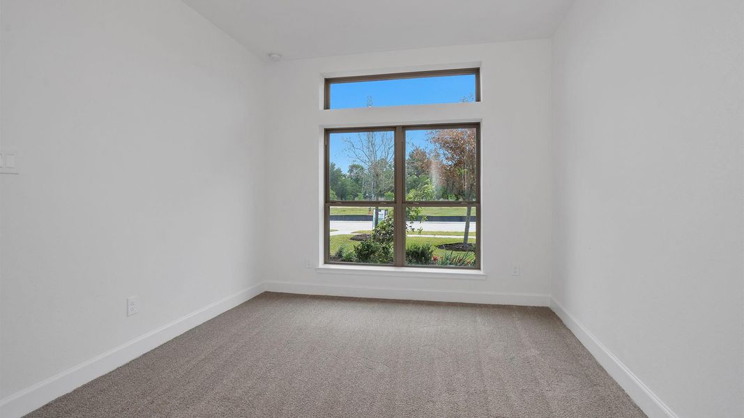 Spacious, unfurnished interior of a new home in Legacy Prairie at Katy Court, Katy (Image 8).