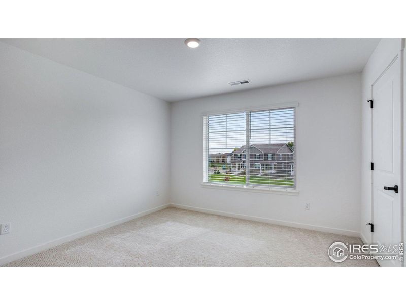 Spacious, unfurnished interior of a new home in Hansen Farm, Fort Collins (Image 29).