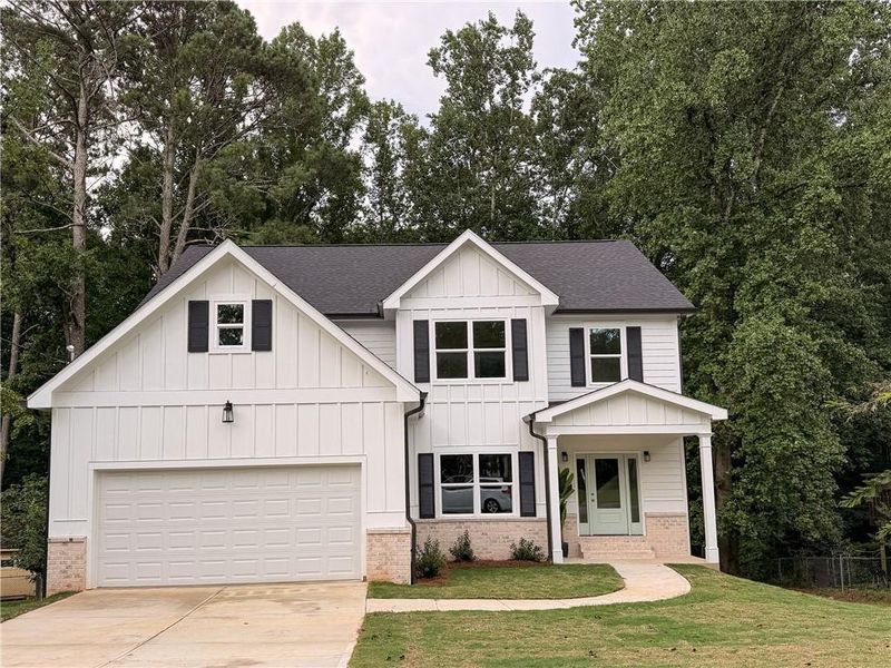 Front exterior of a new home in , Norcross, GA, highlighting curb appeal (Image 29). Front exterior of a new home in , Norcross, GA, highlighting curb appeal (Image 29).