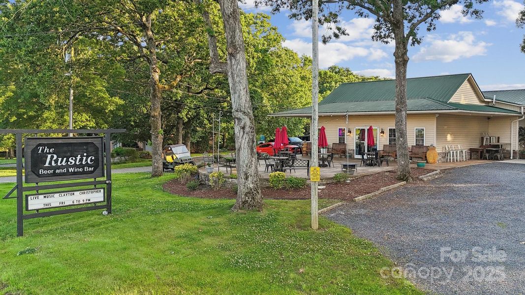Front exterior of a new home in Running Creek, Locust, NC, highlighting curb appeal (Image 21).