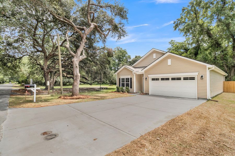 Front exterior of a new home in , Summerville, SC, highlighting curb appeal (Image 26). Front exterior of a new home in , Summerville, SC, highlighting curb appeal (Image 26).