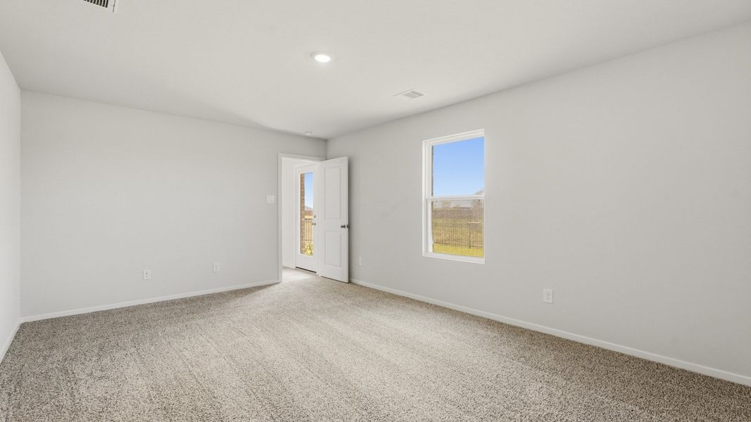 Spacious, unfurnished interior of a new home in Sunterra, Katy (Image 13).