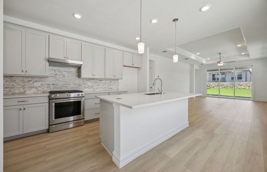 Bright kitchen with premium appliances Bright kitchen with premium appliances