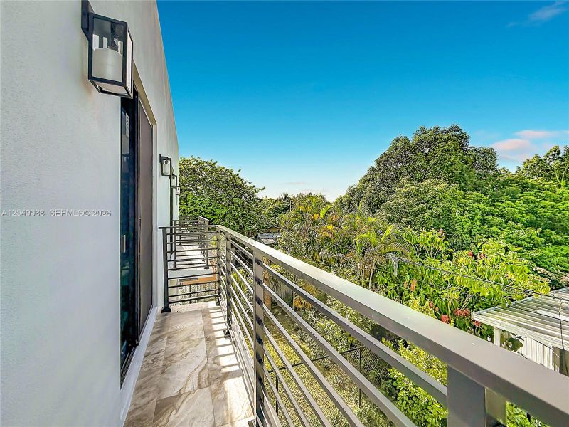 Exterior details and patio area of a home in , Miami (Image 24).