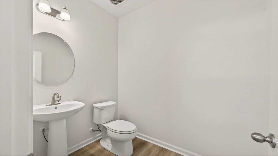 Furnished interior view inside a new home in Creekside at Andrews, Summerville (Image 4). Furnished interior view inside a new home in Creekside at Andrews, Summerville (Image 4).