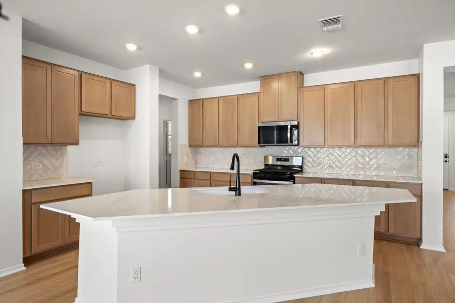 Furnished interior view inside a new home in Salerno - Classic Collection, Round Rock (Image 5).