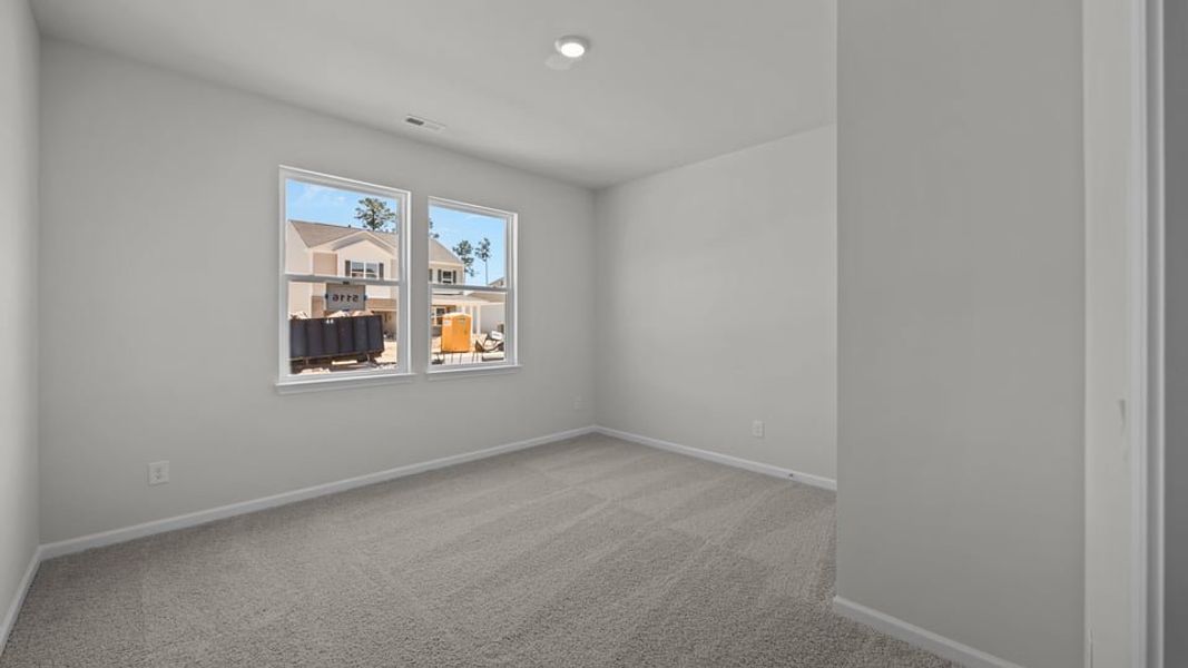 Spacious, unfurnished interior of a new home in East Ridge, Ayden (Image 14).