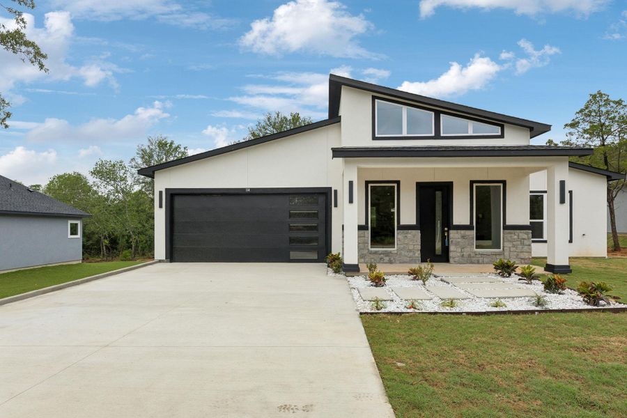 Modern architecture defines this striking home with clean lines and abundant natural light.