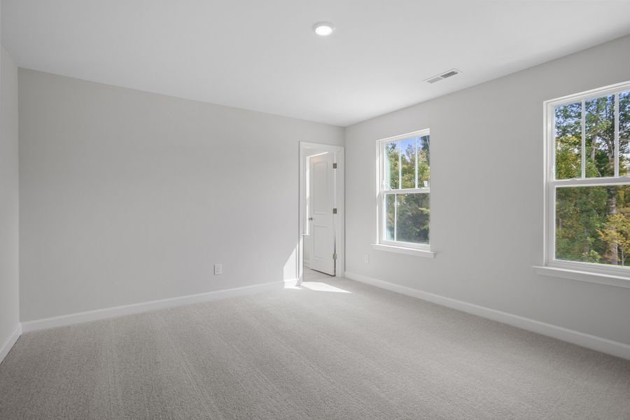 Spacious, unfurnished interior of a new home in Georgias Landing, Raleigh (Image 34).