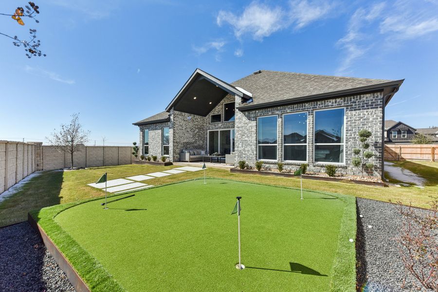 Exterior details and patio area of a home in The Grove at Blackhawk, Pflugerville (Image 32). Exterior details and patio area of a home in The Grove at Blackhawk, Pflugerville (Image 32).